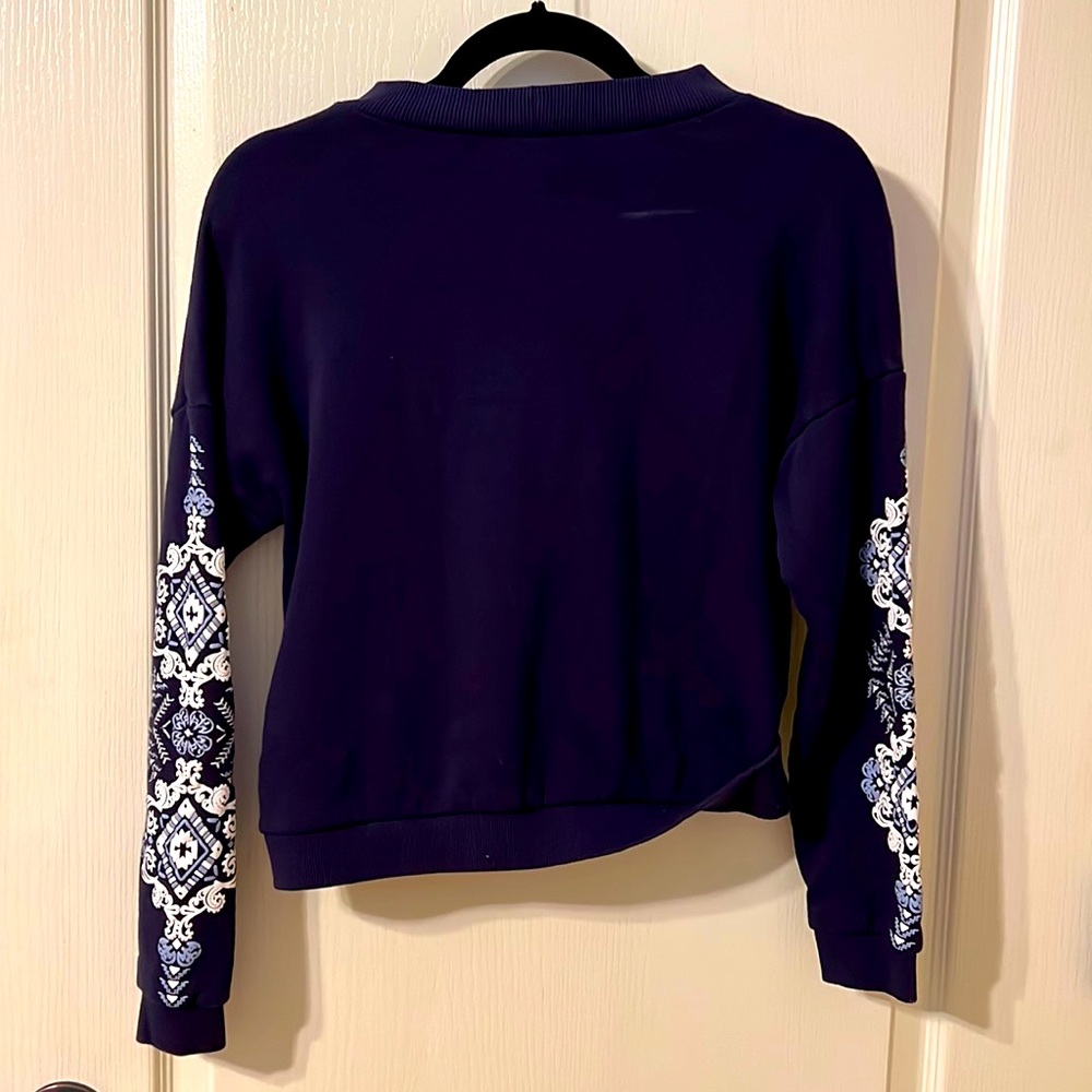 Blue, long cropped top.